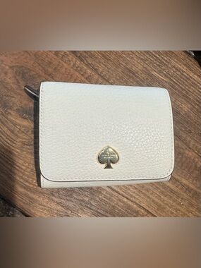 kate spade White Pebbled Leather Wallet with Gold Spade Logo